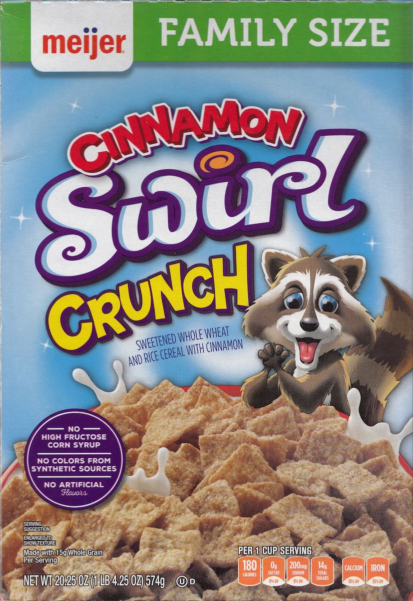 Box front for Meijer's Cinnamon Swirl Crunch, which features an overjoyed, big-eyed raccoon thrilled at the cereal.