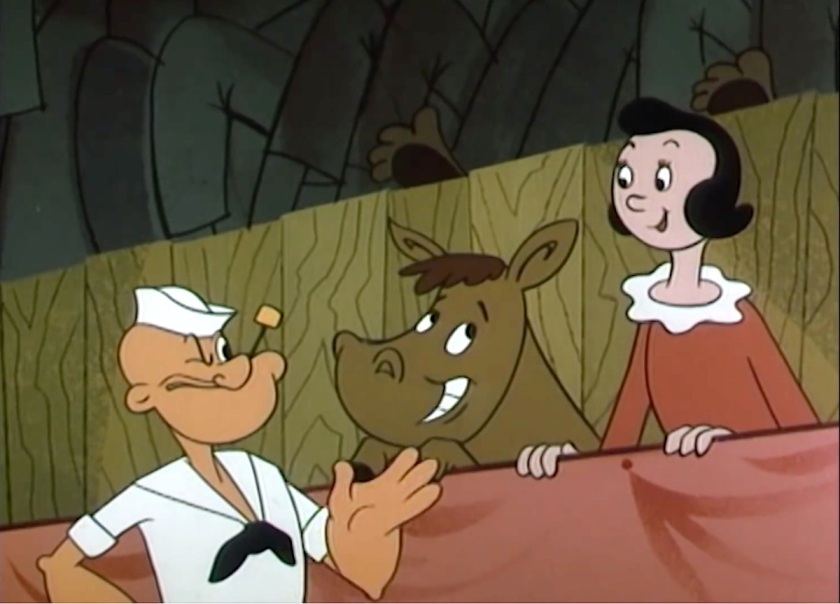 Popeye smiling and holding out his hand, pointing to the calf and Olive Oyl in the stands. Both of them are smiling, the calf with a particularly exaggerated grin that makes it look like it's concealing a deep secret or possibly a crush.