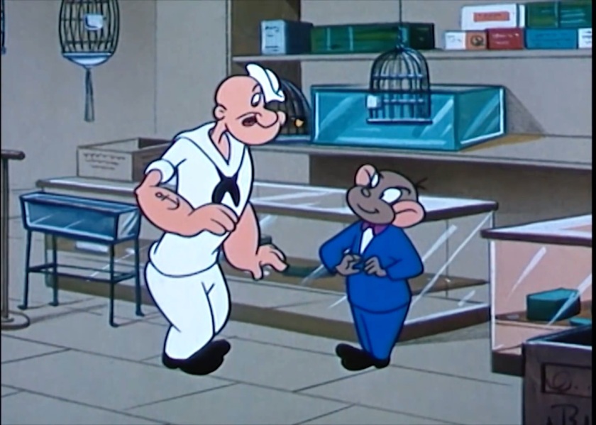 In a pet store, Popeye looks surprised and unsure how to handle the shopkeeper being a monkey in a blue suit.