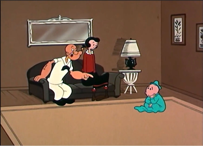 Swee'Pea sits up in the living room, looking sad. Olive Oyl and Popeye watch; Popeye is pointing to Swee'Pea and in the midst of saying something.