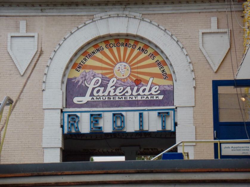 (Daytime) photograph of the exit gate for Lakeside Amusement Park (Denver, Colorado), with the word 'REDIT' spelled out in (not yet illuminated) lights.