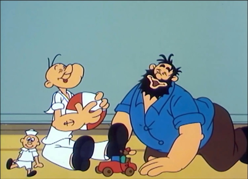 Popeye and Brutus are sitting and crawling on the floor as toddlers, eyes closed and making goofy faces. Around them are a bunch of toys.