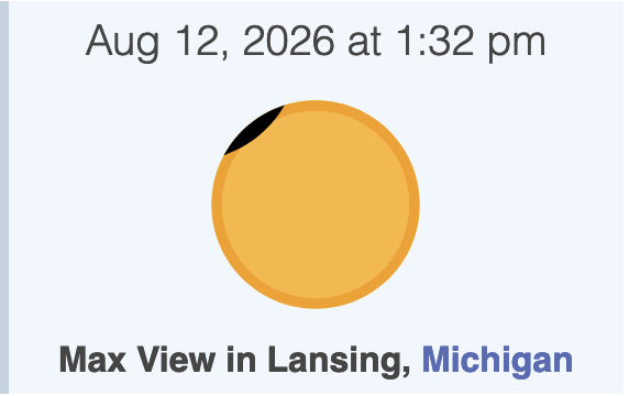 Projection of the maximal coverage of the sun by the moon, showing a tiny black meniscus in the upper left corner of the sun, centered between 10 and 11 o'clock, and covering a tiny slice of the sun's rim.